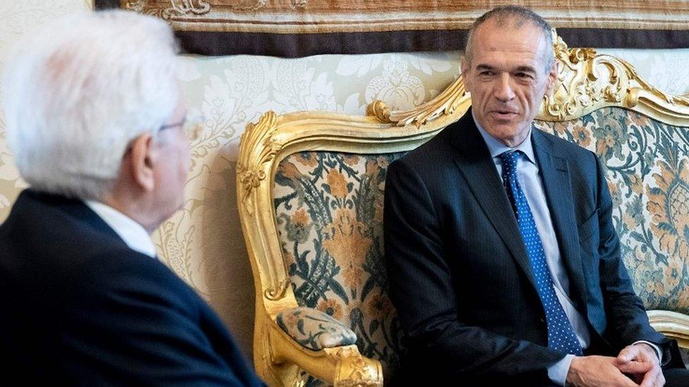 Carlo Cottarelli (left) meets Italian President Sergio Mattarella