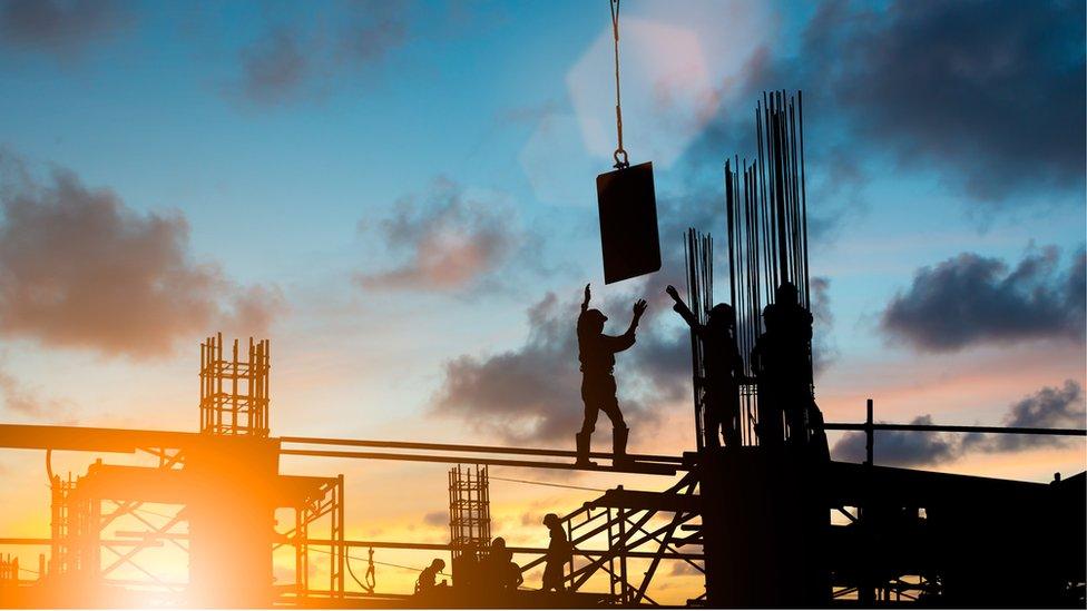 Workers on a building site