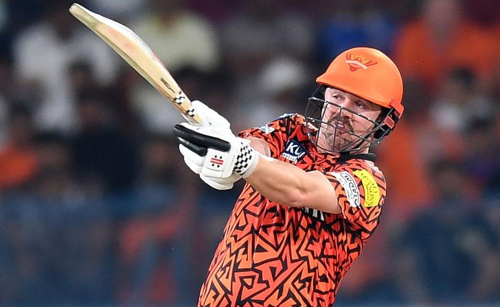 Sunrisers Hyderabad's Travis Head plays a shot during the Indian Premier League (IPL) Twenty20 cricket match between Sunrisers Hyderabad and Mumbai Indians at the Rajiv Gandhi International Stadium in Hyderabad on March 27, 2024. (