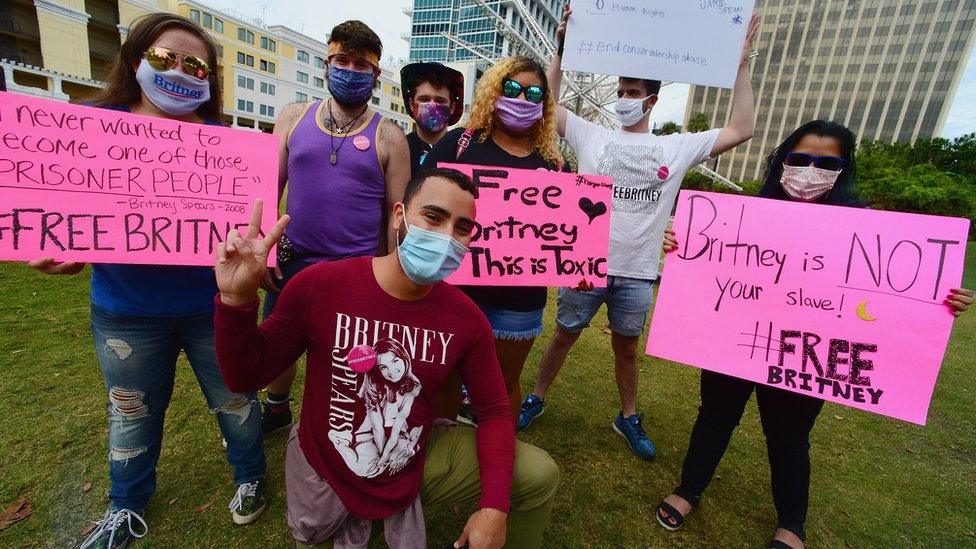 Fans take part in a #FreeBritney protest in Orlando in December