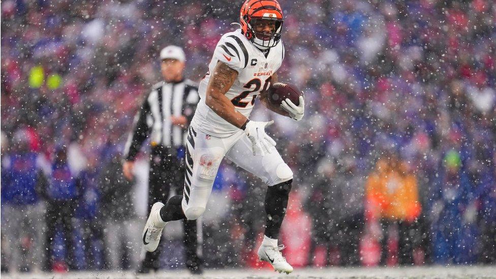 NFL running back Joe Mixon carries the football