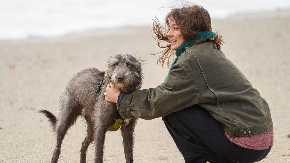 woman and dog.