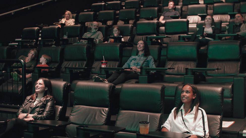 Cinemagoers in a Vue cinema