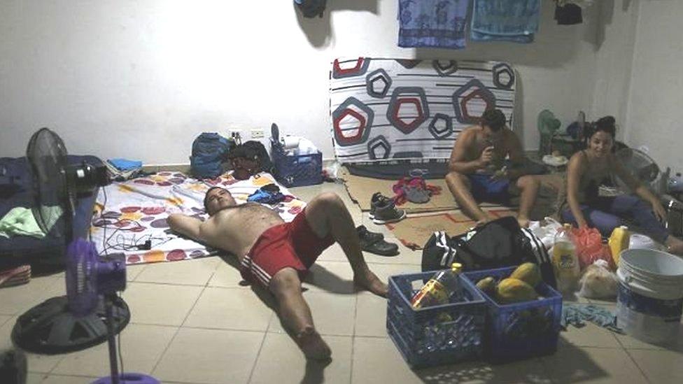 Cuban migrants wait at a Panama hostel