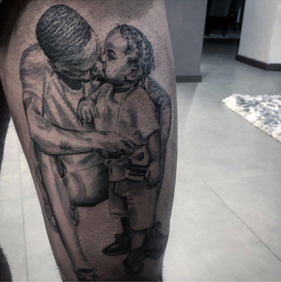 Raheem Sterling's tattoo of himself and his son