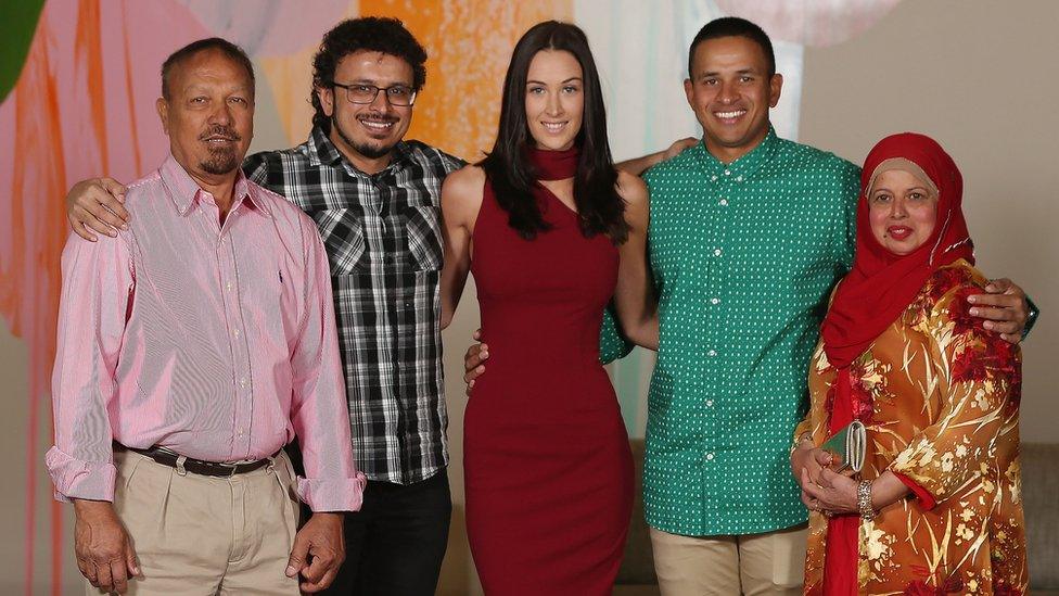 Usman Khawaja (2nd R) poses with Rachel McLellan (C), brother Arsalan Khawaja (2nd L) and other family members at Crown Metropol after the Australian nets session on December 25, 2017 in Melbourne, Australia.