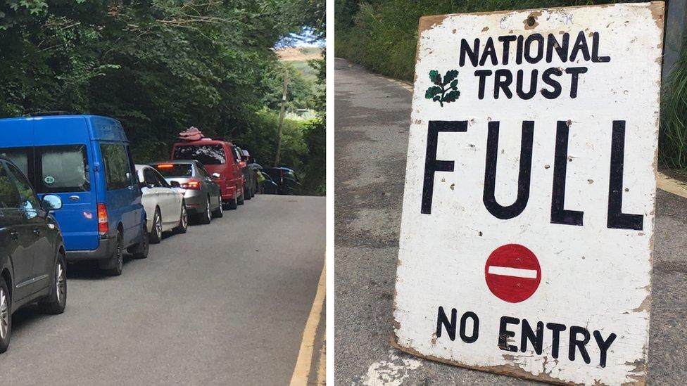 Care queuing for the beach / "car park full" sign