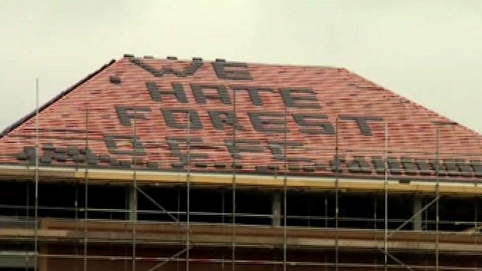 "We hate Forest" on roof of building on A50
