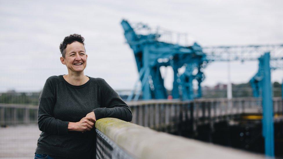 Kari Vickers on the top deck at Dunston Staiths, looking out on to the river