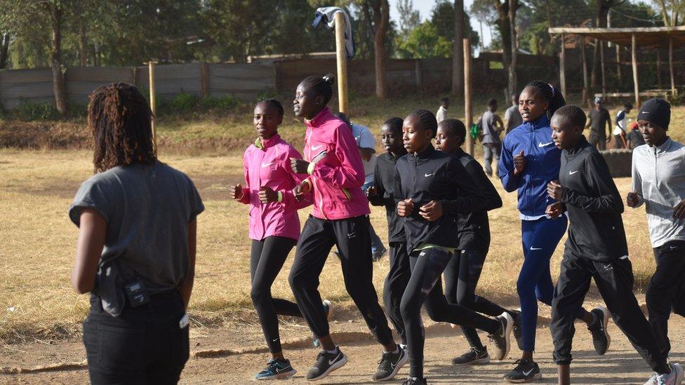 Marathon runner Mary Ngugi coaching girls at Nala Club, a structure she created to help young girls to develop their athletics abilities in a safe environment.