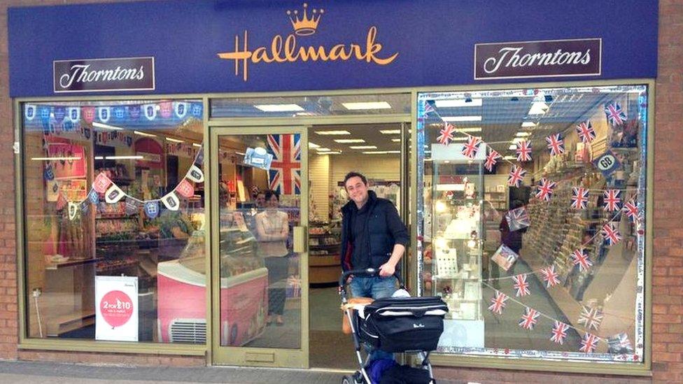 Mark and his son Henry in a pram