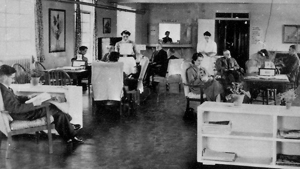 A black and white image showing medical staff and patients at St Peter's