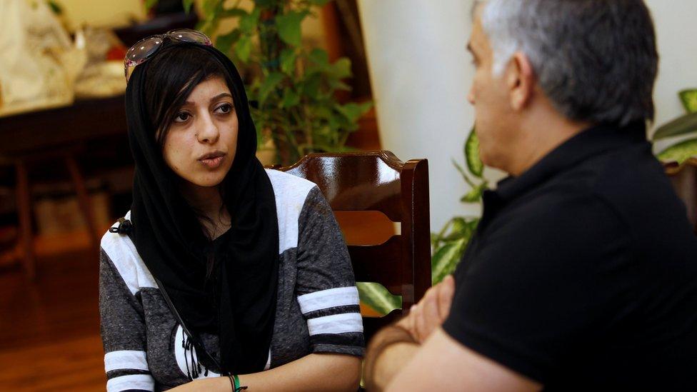 Zainab al-Khawaja (L) and Nabeel Rajab (R) talk after her release from prison in Bahrain (3 June 2016)