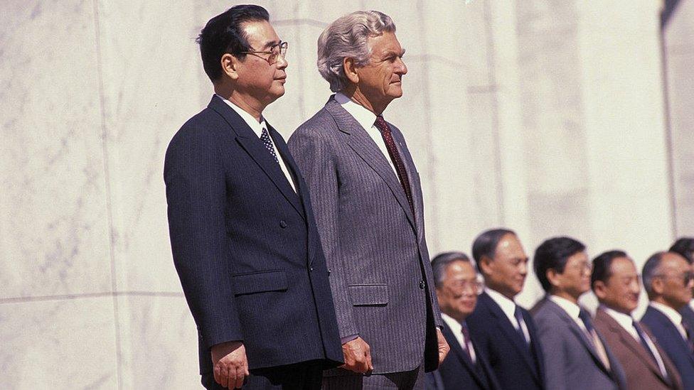 Bob Hawke stands with Chinese Premier Li Peng in 1988 at a formal ceremony in Western Australia