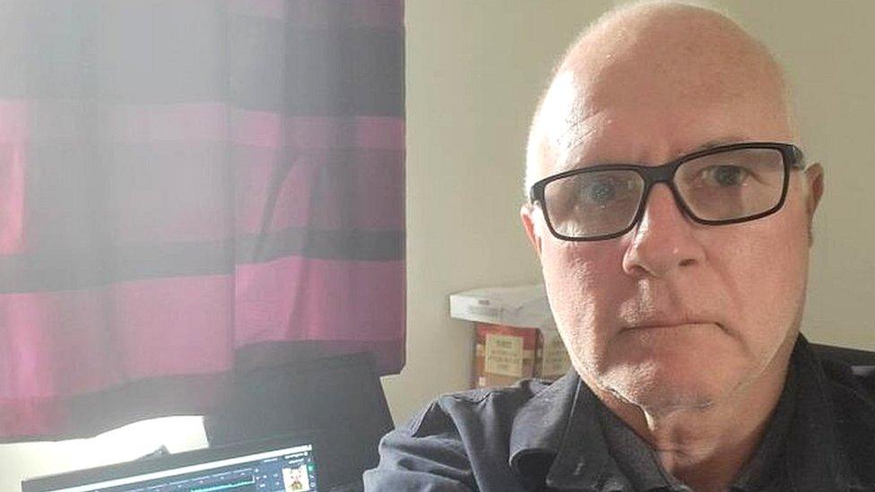 Selfie of Pete O'Brien near his laptop with a DJ playout system on