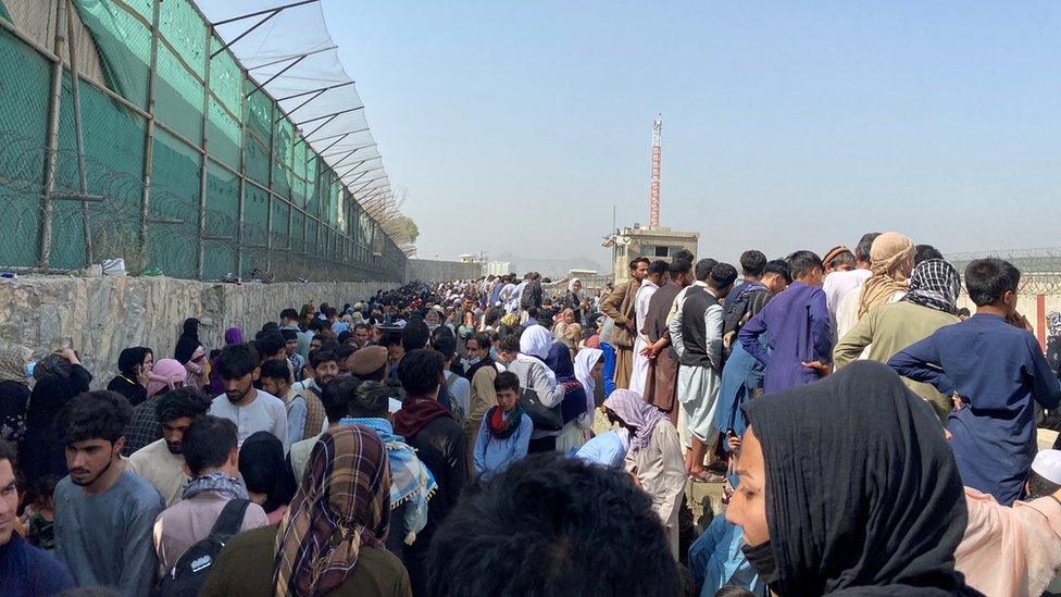 General view of the crowds of people near the airport in Kabul,