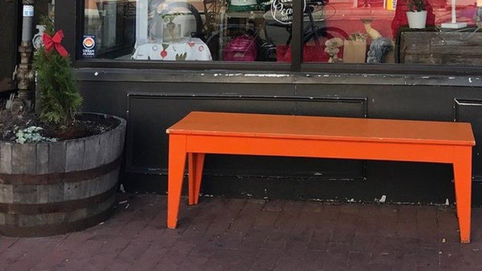 Orange Bench outside of Each Peach Market