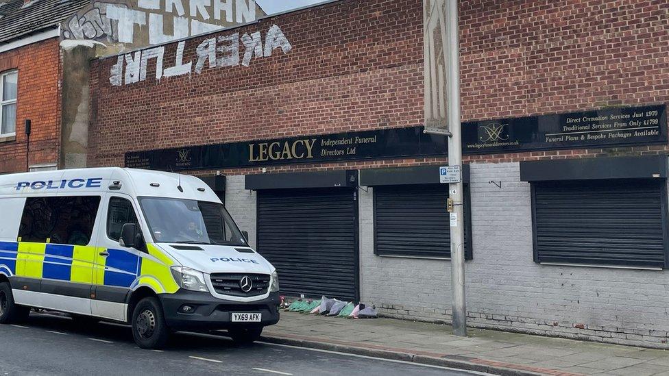 Police van outside a funeral directors premises