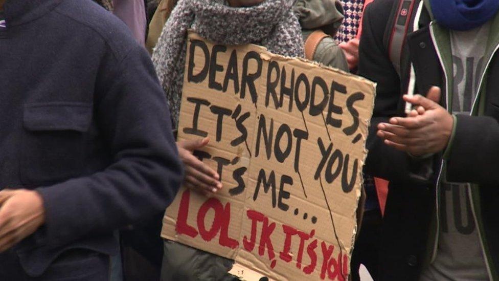 Placards at Rhodes Must Fall march