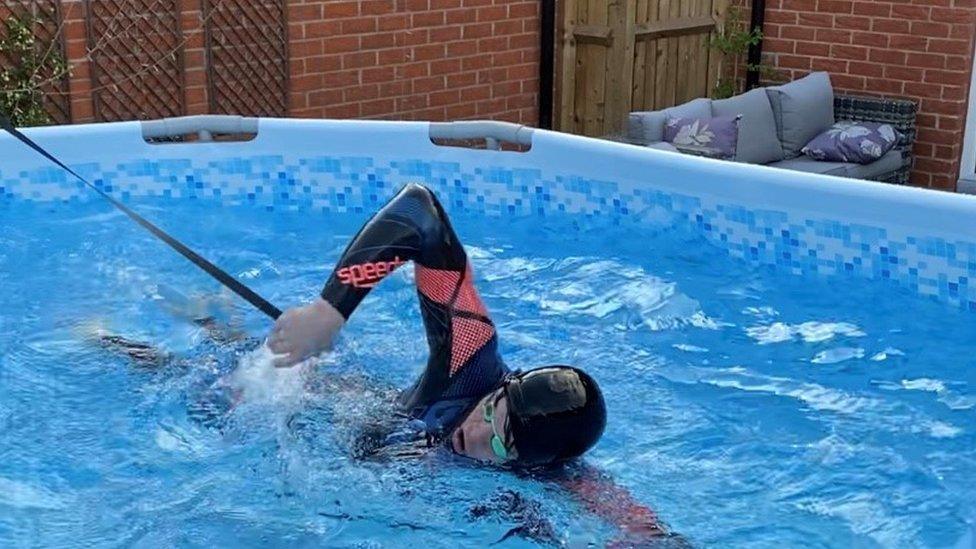 Matt Richards training in an over ground pool at home