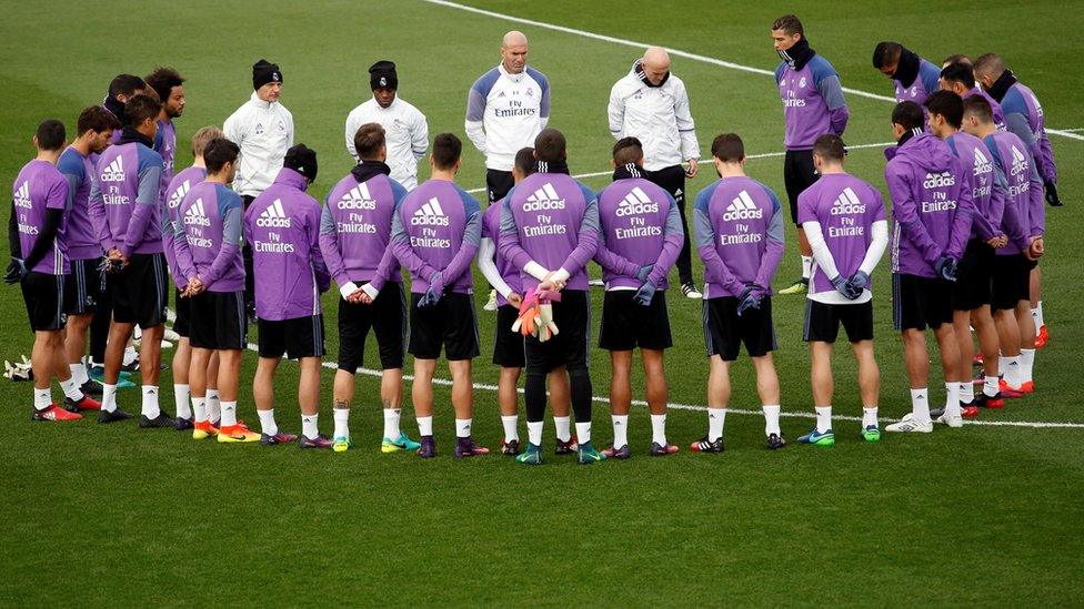 Real Madrid footballers observe a minute's silence