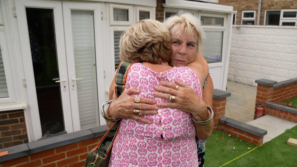 Jayne Knight the Hickmott’s Family Advocate hugs Pam