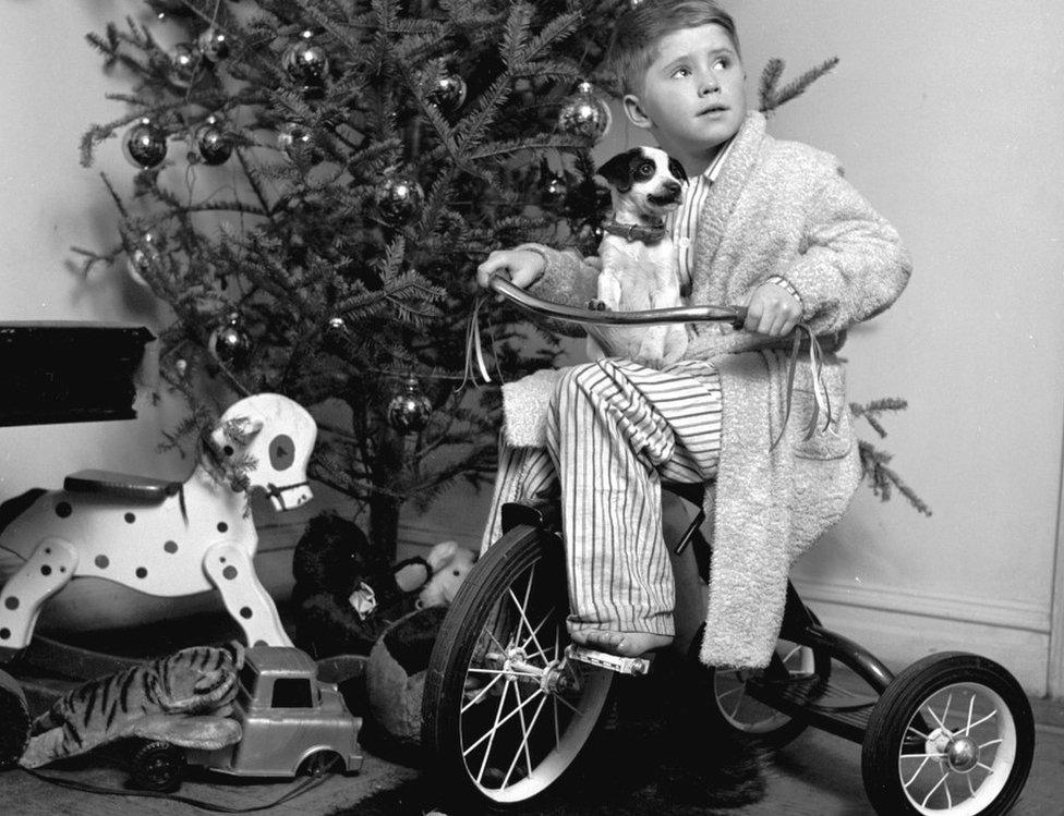 Boy on bike at Christmas