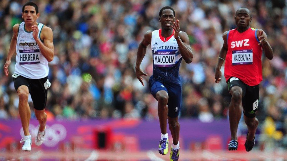 Swaziland's Sibusiso Matsenjwa (right) runs against competitors from Mexico and Great Britain at the London 2012 Olympic Games, 7 August 2012