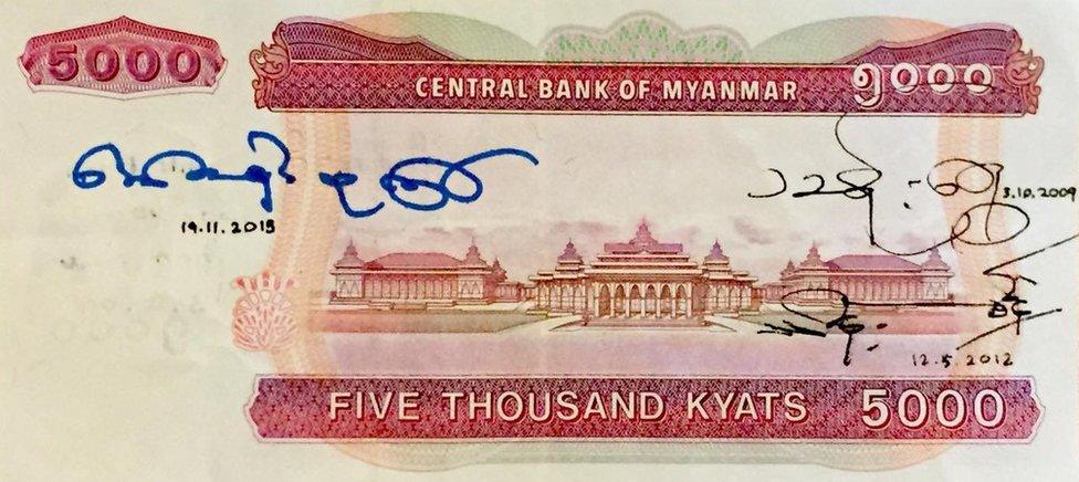 Image of a 5,000 kyat banknote, signed by Aung San Suu Kyi, former dictator Than Shwe and current president Thein Sein