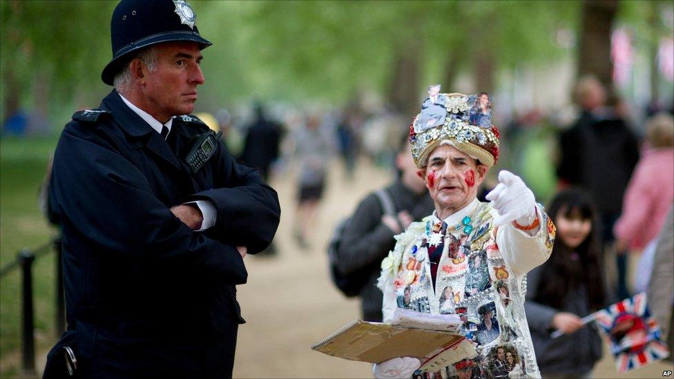 A man talks to a police officer