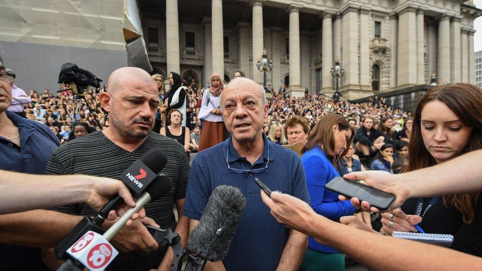 Ms Maasarwe's father Saeed in front of thousands of people at a vigil in central Melbourne in January