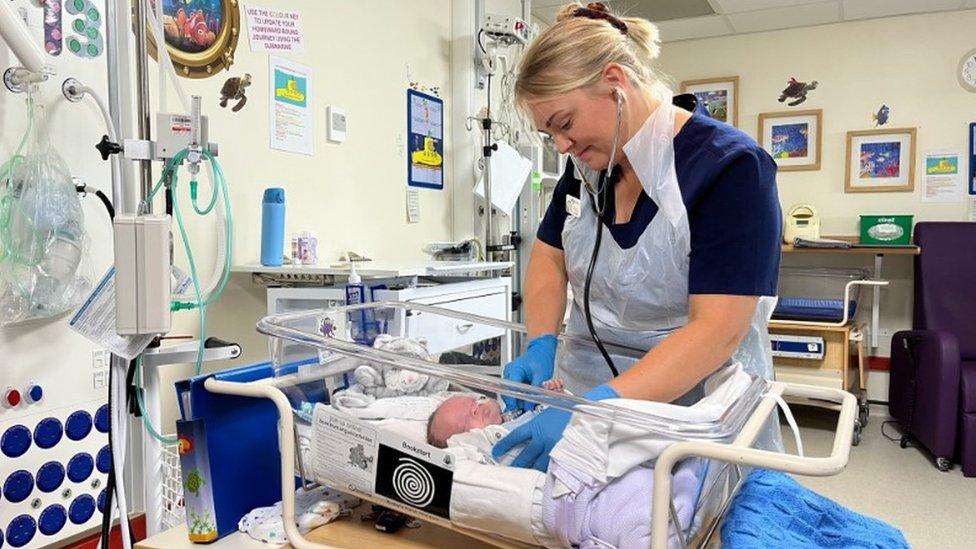 Jenna Wilkes tends to a newborn at Lincoln's neonatal unit