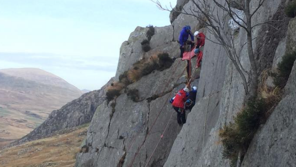 Woman rescued from cliff face