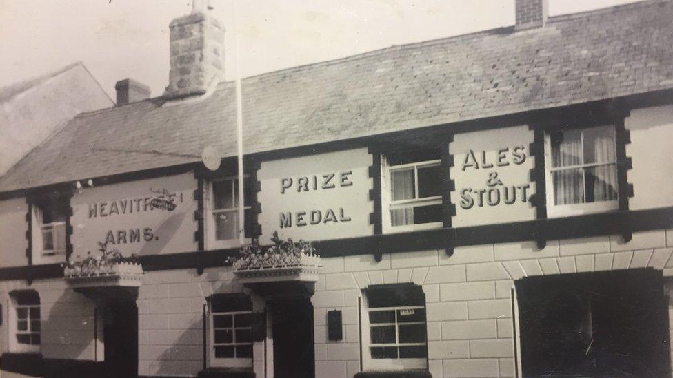 A black and white shot of the old King of Prussia pub, in Bovey Tracey