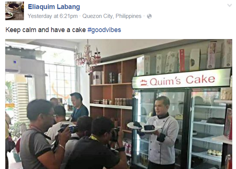 A grab of a Facebook post by Eliaquim Labang which shows him posing for photographers in his cake shop