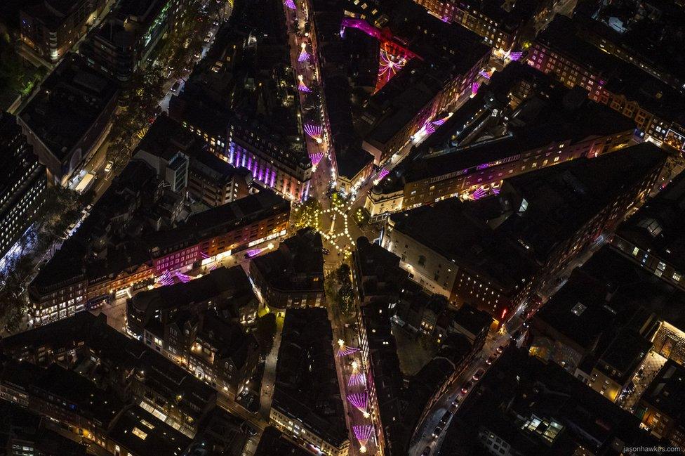 Night aerial view of Christmas lights, Seven Dials