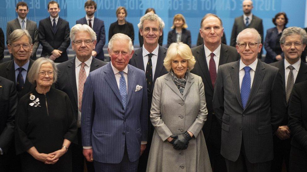 Britain's Prince Charles, Prince of Wales (2L) and Britain's Camilla, Duchess of Cornwall (2R) pose with with Justices of the Supreme Court including President of the Supreme Court, Baroness Brenda Hale (L) and Deputy President Lord Reed (R) during their visit to The Supreme Court in central London, on February 5, 2019,