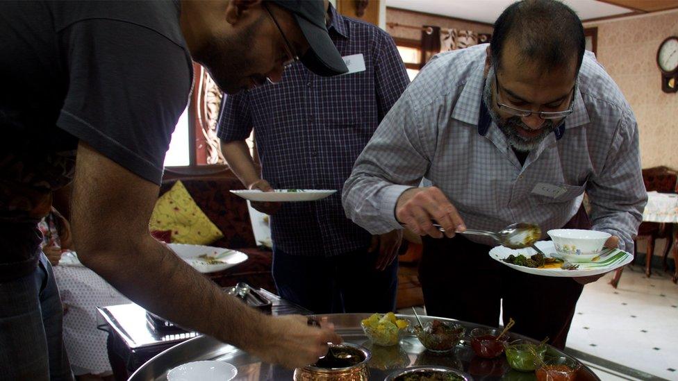 TBK guests eat a Thali