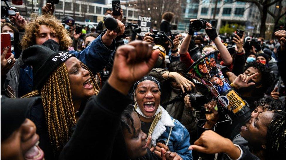 People celebrate as Derek Chauvin's guilty verdict is announced