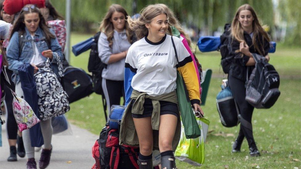 Girls arrive with camping kit