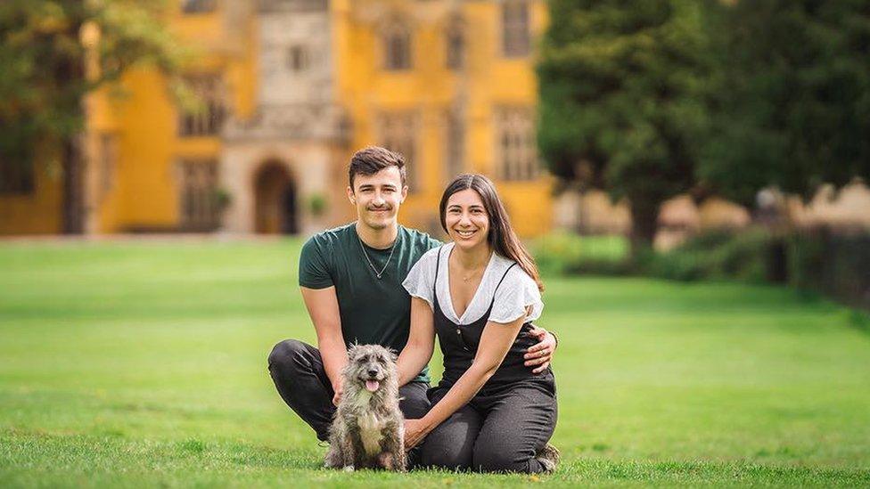 Ms Olmos with her partner and her dog