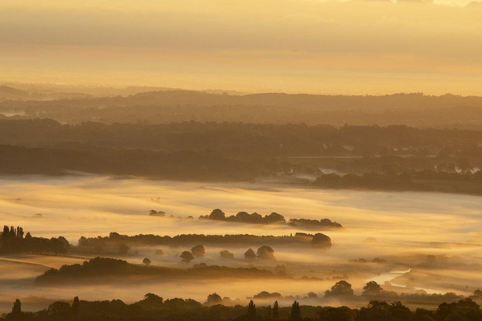 The sun rises over the South Downs National Park