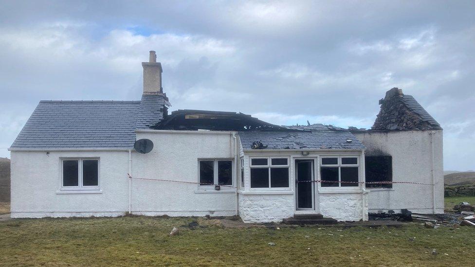 Taigh air an do rinn dealanach milleadh