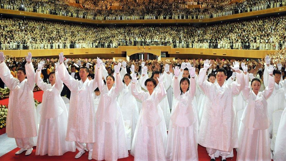 Unification Church members at the funeral of their founder Sun Myung Moon