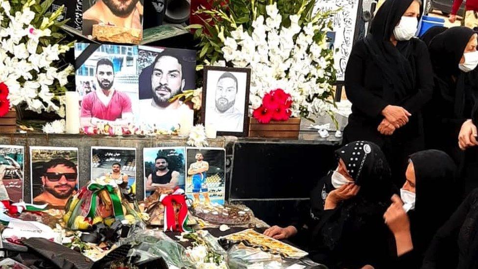 Mourners at Navid's grave in Shiraz