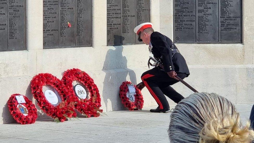 A photo of wreath laying