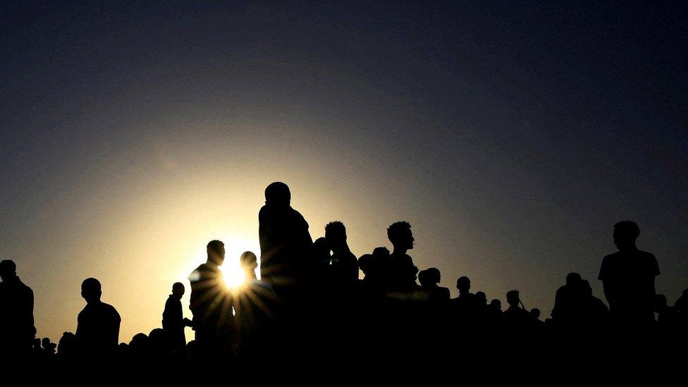 Ethiopians who fled the ongoing fighting in Tigray region, gather in Hamdayet village near the Sudan-Ethiopia border, eastern Kassala state, Sudan November 22, 2020