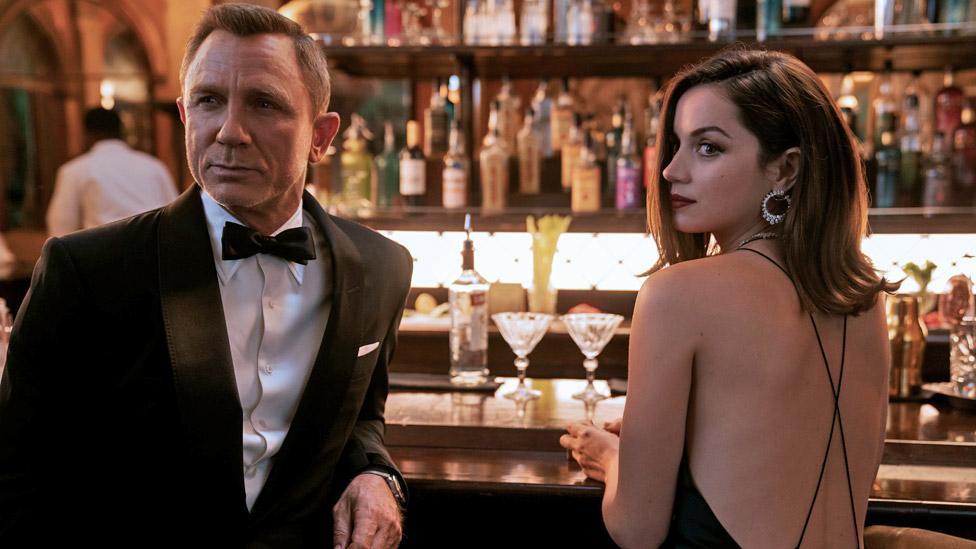 Daniel Craig as James Bond