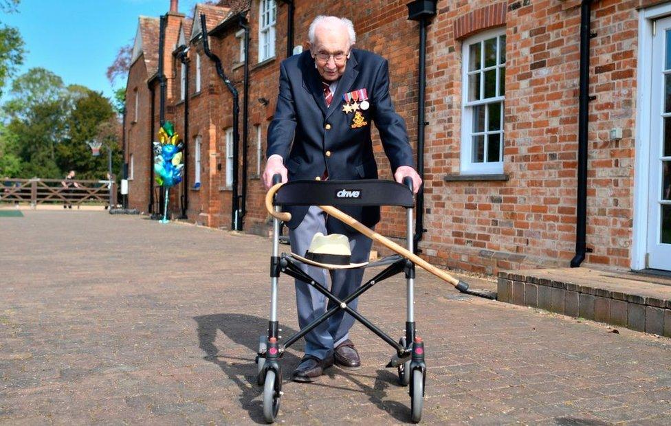 Capt Sir Tom Moore leaning on his walker