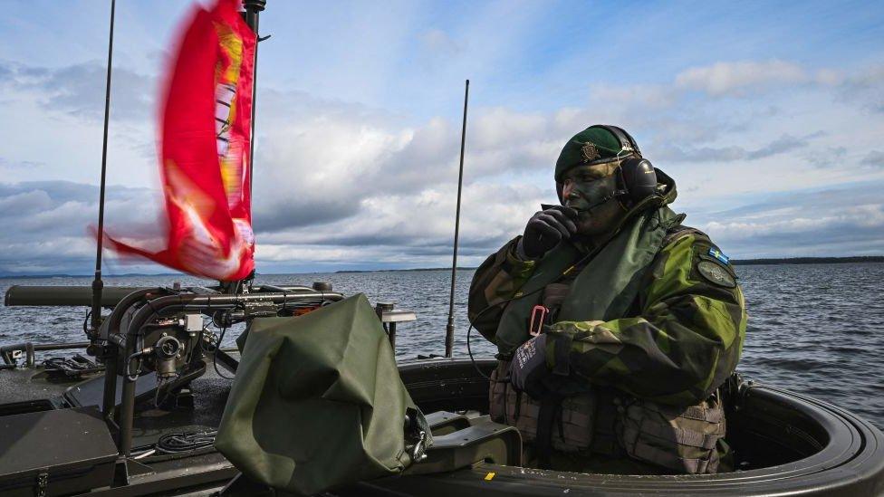 soldiers from the Swedish Amphibious Corps is pictured on board the CB90-class fast assault craft, as they participate in the military exercise Archipelago Endeavor 23 on Mallsten island in the Stockholm Archipelago on September 13, 2023